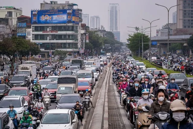 Motorists in traffic in Hanoi, Vietnam, on Tuesday, March 21, 2023. Vietnam is scheduled to release it's annual gross domestic product (GDP) figures on March 29. (Photo by Linh Pham/Bloomberg)