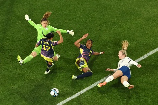 Colombia's midfielder #17 Carolina Arias (2L) picks up an injury during the Australia and New Zealand 2023 Women's World Cup quarter-final football match between Colombia and England at Stadium Australia in Sydney on August 12, 2023. (Photo by David Gray/AFP Photo)