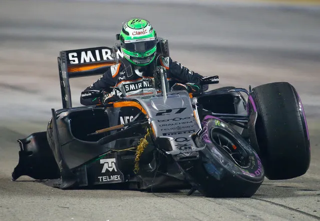 Force India's Nico Hulkenberg reacts after crashing during the Singapore Grand Prix September 18, 2016. (Photo by Jeremy Lee/Reuters)