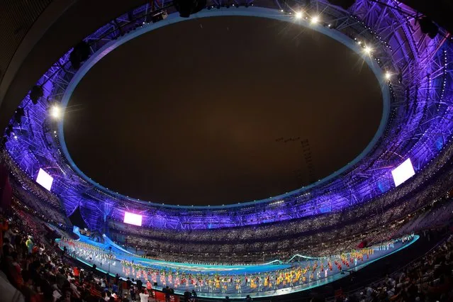 Performers during the opening ceremony of the 19th Asian Games Hangzhou 2022 at the Olympic Sports Centre Stadium in Hangzhou, China, 23 September 2023. The 2022 Asian Games were postponed due to the Covid-19 pandemic and are held between 23 September and 08 October 2023. (Phoot by Alex Plavevski/EPA)