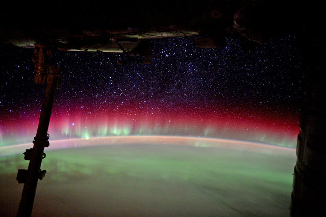 ESA astronaut Tim Peake posted this stunning image on his social media channels, commenting: “Station passed through magnificent aurora Australis last night”. Tim is set to return to Earth on 18 June 2016, bringing his six-month Principia mission to the ISS to an end. During his stay he performed more than 30 scientific experiments for ESA and taking part in numerous others from ESA's international partners. ESA and the UK Space Agency have partnered to develop many exciting educational activities around the Principia mission, aimed at sparking the interest of young children in science and space. (Photo by Tim Peake/ESA/NASA)