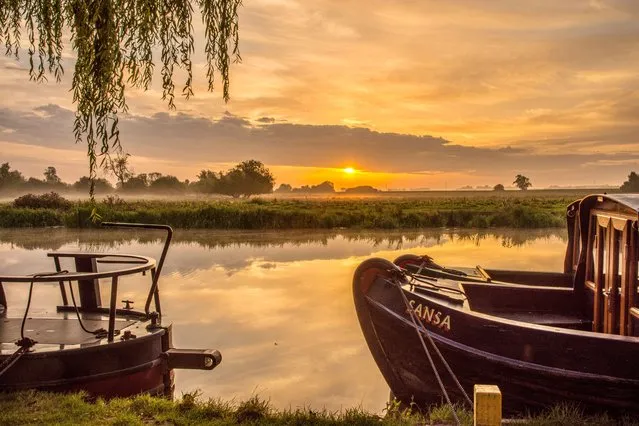The picture dated August 24, 2023 shows the sunrise over the River Great Ouse in Ely, UK this morning. Today is set to see a mix of sunshine and showers. Some showers may be heavy and thundery across southern England. (Photo by Veronica Johansson Poultney/Bav Media)