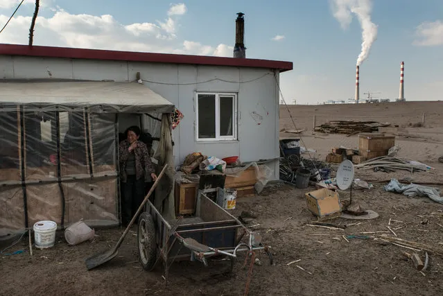 The home of a herder in front near the Datang plant. Nomadic pastoralists have lived on the grasslands of Inner Mongolia for thousands of years, but many are being pushed from their homes by mining and mineral industries. (Photo by Gilles Sabrie/The Washington Post)