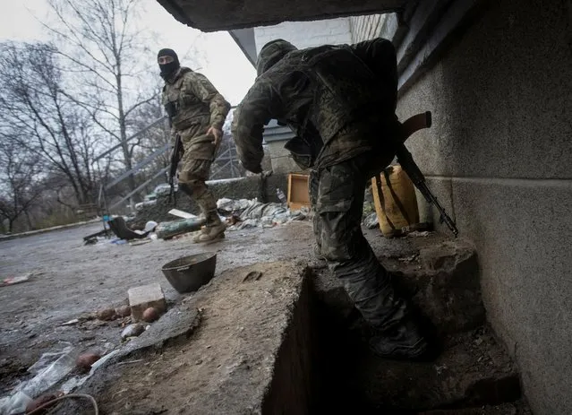 Ukrainian service members are seen in Bakhmut, as Russia's attack on Ukraine continues, in Donetsk region, Ukraine on December 9, 2022. (Photo by Yevhen Titov/Reuters)