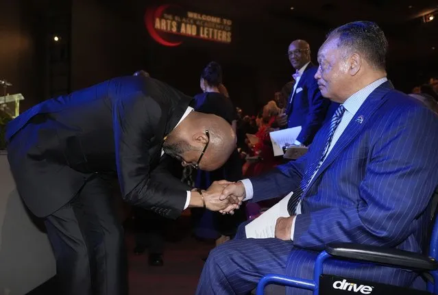 The Rev. Frederick D. Haynes III, left, bows while greeting the Rev. Jesse Jackson before speaking in Dallas, late Thursday, February 1, 2024. The civil rights group founded by Jackson in the 1970s is elevating a new leader for the first time in more than 50 years, choosing Haynes as his successor to take over the Rainbow PUSH Coalition. (Photo by LM Otero/AP Photo)