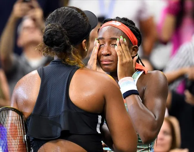 Naomi Osaka of Japan (L) consoles Coco Gauff of the U.S. after their third round match at the U.S. Open tennis tournament in Flushing, New York, August 31, 2019. Gauff, 15, said she would leave New York a better player after falling to world number one Osaka. Backed by lively support from the packed home crowd, the young American was clearly overmatched against the defending champion, who needed just over an hour to book her ticket to the fourth round. Osaka, 21, showed impressive sportsmanship by giving Gauff the opportunity to thank her fans in the post-match interview on the showcase court. “It was amazing. I'm going to learn a lot from this match”, a tearful Gauff said after the 6-3 6-0 defeat. (Photo by Robert Deutsch/USA TODAY Sports)