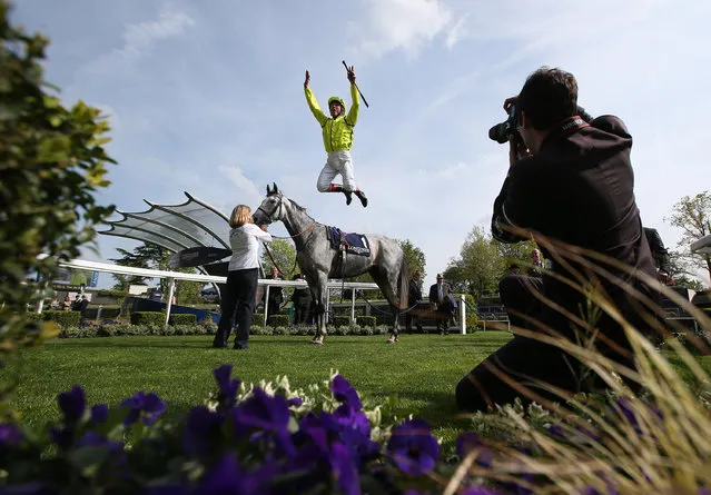 Frankie Dettori celebrates after ridding Tac De Boistron to victory in The Longines Sagari Stakes at Ascot racecourse on April 30, 2014 in Ascot, England. (Photo by Charlie Crowhurst/Getty Images)