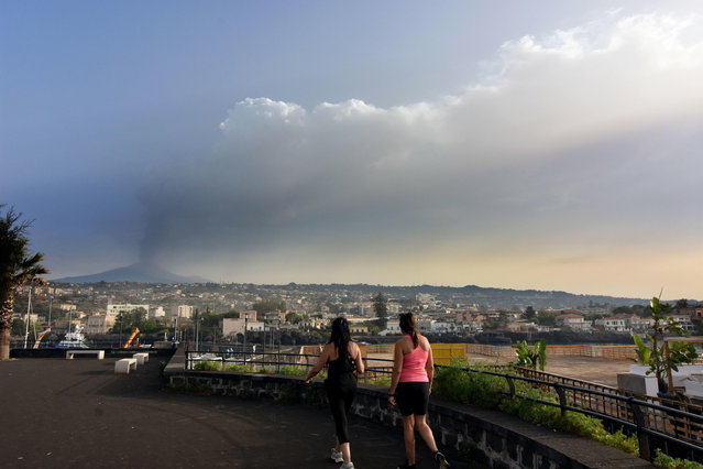 The Central Crater of Etna releases a cloud of ashes after a new eruption Catania, Sicily, Italy, 07 July 2024. Mount Etna has seen fresh explosive activity with fallout of volcanic waste on the towns of the Ionian coast for the second time in 48 hours, after eruption on 05 July caused the closure of the airspace at the Catania airport. (Photo by Orietta Scardino/EPA)