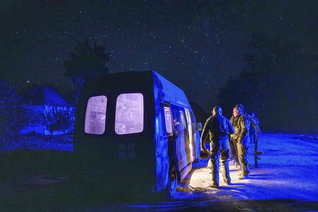 Ukrainian soldiers who just came from battle stand near an ambulance at a 47th Brigade field hospital near Avdiivka, in Ukraine’s Donetsk region, on Friday, May 10, 2024. (Photo by Evgeniy Maloletka/AP Photo)