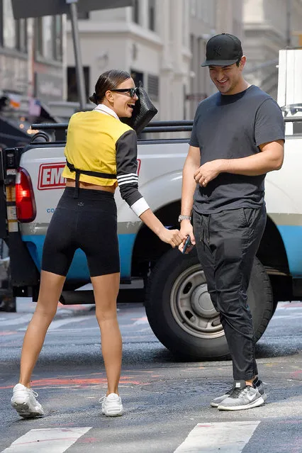 Irina Shayk and a mystery man spend a day at Juvenex Spa in New York City on October 2, 2019. Irina and mystery man then walked down 5th Ave and bumped into a friend who gave Irina complements. Irina blew him kisses in response. (Photo by Robert O'Neil/Splash News and Pictures)