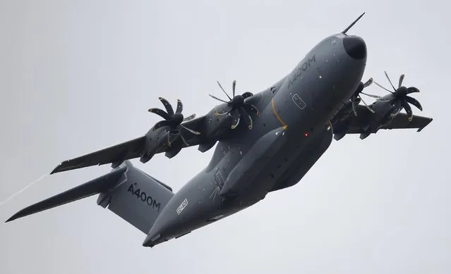 An Airbus A400M aircraft takes part in a flying display at the Royal International Air Tattoo at RAF Fairford, Britain July 17, 2015. (Photo by Peter Nicholls/Reuters)