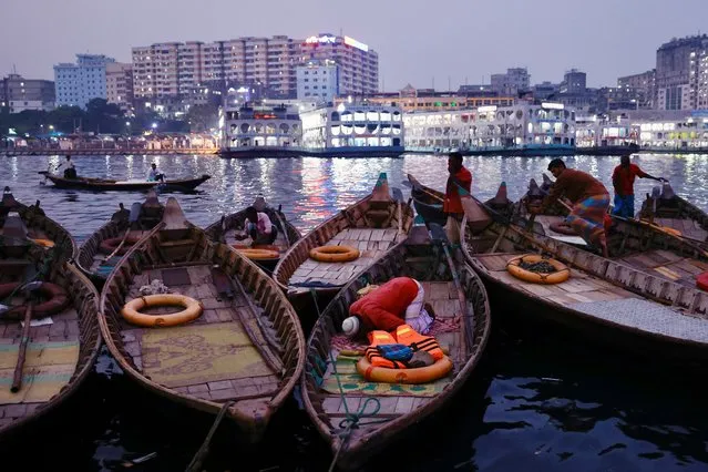 A Muslim boatman performs an evening prayer on his boat after breaking the fast during the holy month of Ramadan in Dhaka, Bangladesh, April 11, 2022. (Photo by Mohammad Ponir Hossain/Reuters)