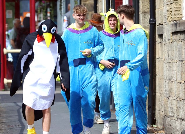 Bank Holiday revellers donned fancy dress at the booze-fuelled Otley Run as they kicked off celebrations for the long weekend in Leeds, UK on August 24, 2024. Hundreds of rowdy drinkers donned animals prints and colourful outfits on Saturday as they took to the streets for a pub crawl with pals. (Photo by NB Press LTD)