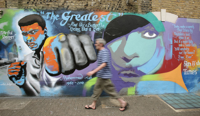 A graffiti mural of boxer Muhammad Ali and singer Prince – who would have been 58 today – in Camberwell, south London on Tuesday June 7, 2016 as actor Will Smith and former world heavyweight boxing champion Lennox Lewis will be pallbearers at Muhammad Ali's funeral, it has been announced. Smith, who portrayed Ali in the 2001 film about the boxer's life, and Lewis will be among up to 15,000 people expected to attend the funeral service in Ali's home town of Louisville, Kentucky on Friday. (Photo by Yui Mok/PA Wire)