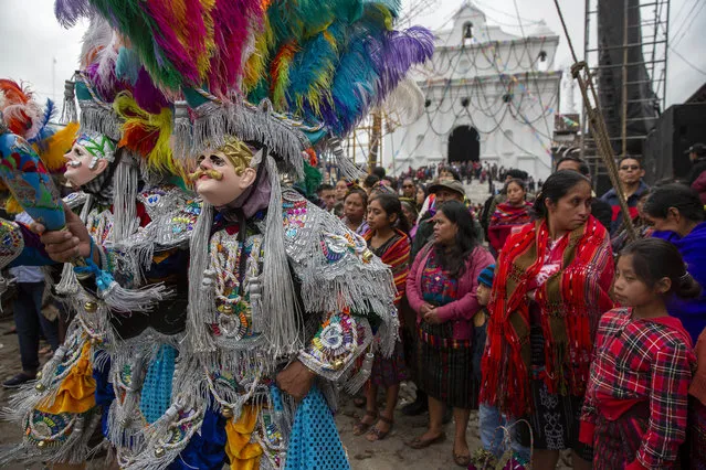 Dancers perform “El torito”, during a celebration honoring Saint Thomas, the patron saint of Chichicastenango, Guatemala, Saturday, December 21, 2019. The Feast of Saint Thomas draws international tourists with its colorful pageantry, but at its heart is a religious celebration melding Catholic and indigenous traditions that culminates on Dec. 21. (Photo by Moises Castillo/AP Photo)