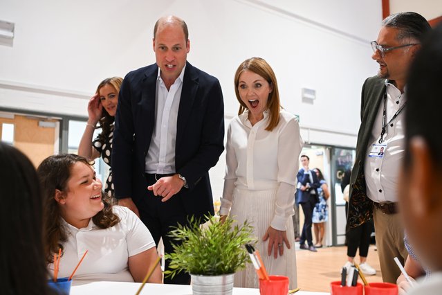 Prince William, Prince of Wales and Geri Halliwell meet children during a visit to Maindee Primary School on June 26, 2023 in London, England. The Prince of Wales has launched Homeward, a five-year programme delivered by the Royal Foundation, which will aim to demonstrate the possibility of ending homelessness. He is currently on a 2 day tour of the United Kingdom, visiting charities working to prevent homelessness in England, Scotland and Wales. (Photo by Finnbarr Webster/Getty Images)