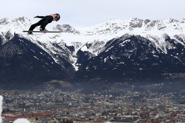 Ryoyu Kobayashi of Japan soars through the air during the trial round of the third stage of the 68th four hills ski jumping tournament in Innsbruck, Austria, Friday, January 3, 2020. (Photo by Matthias Schrader/AP Photo)