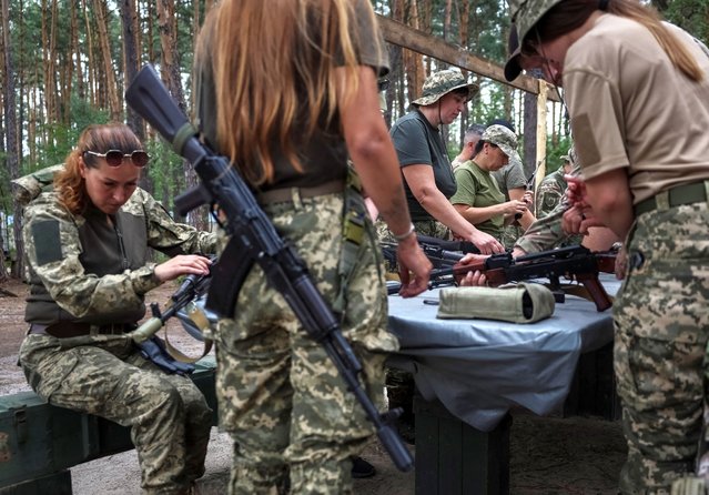 Members of the female anti-drone mobile air defence unit “Bucha Witches” from the military Volunteer formation of Bucha territorial community, attend exercises near the town of Bucha in Kyiv region, Ukraine on August 3, 2024. (Photo by Gleb Garanich/Reuters)