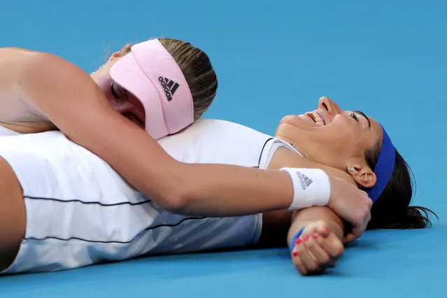 Caroline Garcia and Kristina Mladenovic of France celebrate winning the doubles match against Ash Barty and Sam Stosur of Australia on day 2 of the Fed Cup Final tennis competition between Australia and France at RAC Arena in Perth, Australia, 10 November 2019. (Photo by Richard Wainwright/EPA/EFE)