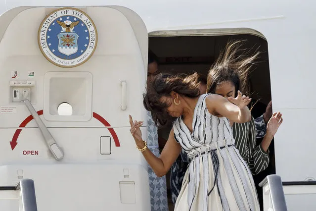 United States of America First Lady Michelle Obama disembarks  a plane, on her arrival at Torrejon de Ardoz military base near Madrid, Spain, Wednesday, June 29, 2016. U.S. first lady Michelle Obama has arrived in Spain on the final leg of a three-nation tour to promote her global girls' education initiative. (Photo by Daniel Ochoa de Olza/AP Photo)