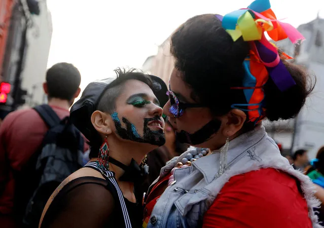 Revellers attend a the Gay Pride parade in downtown Lima, Peru on July 2, 2016. (Photo by Guadalupe Pardo/Reuters)