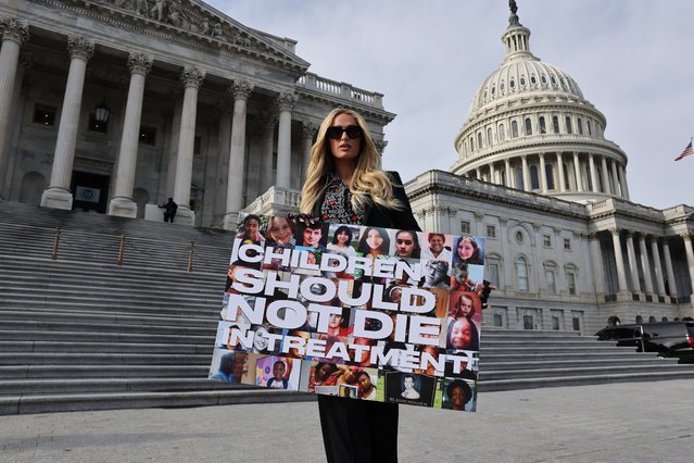 Celebrity hotel heiress Paris Hilton poses for photographs outside the U.S. Capitol on the day the House of Representatives is set to vote on The Stop Institutional Child Abuse Act on December 17, 2024 in Washington, DC. Citing her own traumatizing experience at Provo Canyon School in Utah when she was a teenager, Hilton has lobbied for three years for the legislations that would place greater federal safeguards on institutional youth treatment programs. (Photo by Chip Somodevilla/Getty Images)