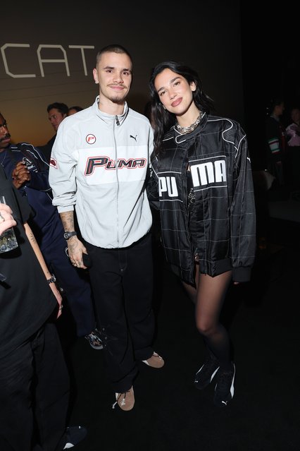 English former footballer Romeo Beckham and English-Albanian singer Dua Lipa attend the PUMA Speedcat Launch Celebration at The Mall on December 10, 2024 in Milan, Italy. (Photo by Jacopo M. Raule/Getty Images for Puma)