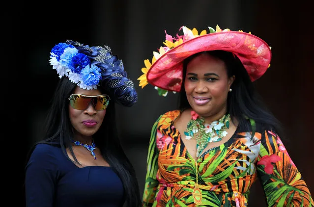 Racegoers attend day four of The Qatar Goodwood festival in Goodwood, England on July 29, 2016. (Photo by John Walton/PA Wire)