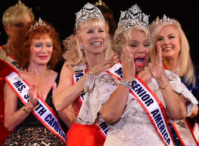 Ms. New Jersey Carolyn Slade Harden is crowned Ms. Senior America during the 38 th Annual National Ms. Senior America 2017 Pageant at the Resorts Casino Hotel in Atlantic City, New Jersey October 19, 2017. The pageant is held for women between the ages of 60 and 90, where they participate in evening gown presentations, talent performances, and a category in which competitors share their life philosophy. (Photo by Timothy A. Clary/AFP Photo)