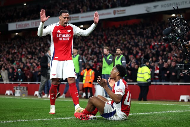 Myles Lewis-Skelly of Arsenal celebrates scoring his team's third goal with teammate Gabriel during the Premier League match between Arsenal FC and Manchester City FC at Emirates Stadium on February 02, 2025 in London, England. (Photo by Alex Pantling/Getty Images)