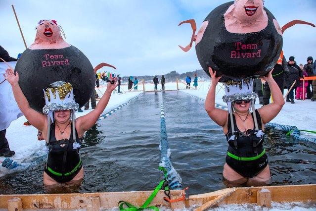 Swimmers take part in the 25 meter hat competition swim during the Memphremagog Winter Swimming Festival at lake Memphremagog in Newport, Vermont on February 21, 2025. (Photo by Joseph Prezioso/AFP Photo)