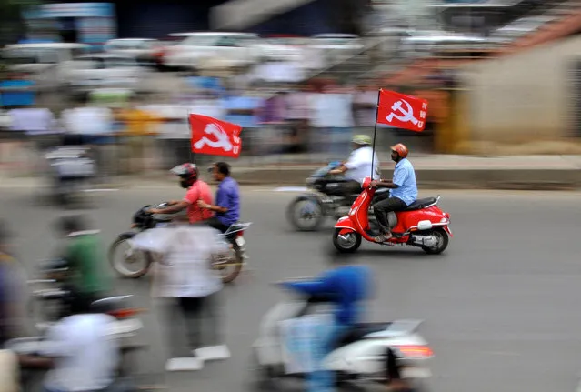 Workers from different trade unions ride motorcycles during a protest rally, as part of a nationwide strike, in Bengaluru, India September 2, 2016. (Photo by Abhishek N. Chinnappa/Reuters)