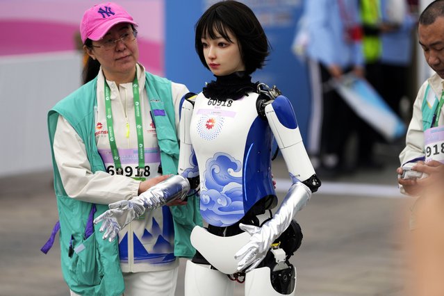 A robot attends the Humanoid Robot Half-Marathon held in Beijing on Saturday, April 19, 2025. (Photo by Ng Han Guan/AP Photo)