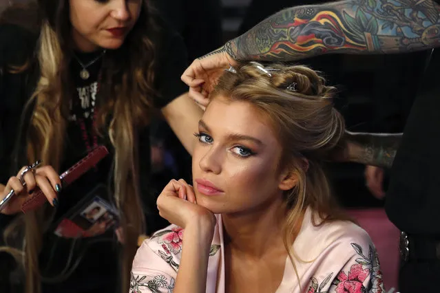 In this November 20, 2017, file photo, model Stella Maxwell of New Zealand is made up at backstage before the Victoria's Secret fashion show inside the Mercedes-Benz Arena in Shanghai, China. (Photo by Andy Wong/AP Photo)