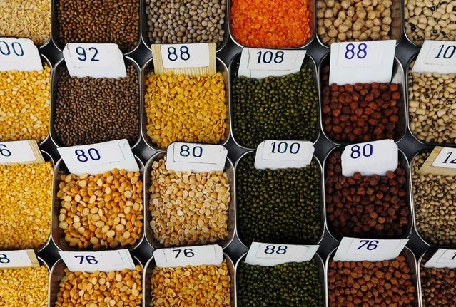 Price tags are seen on the samples of pulses that are kept on display for sale at a market in Mumbai, India January 29, 2018. (Photo by Danish Siddiqui/Reuters)