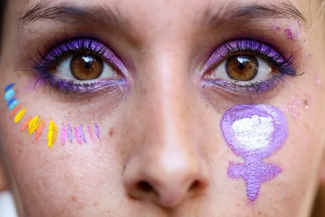 A demonstrator looks on during a rally to mark the International Women's Day in Buenos Aires, Argentina on March 8, 2023. (Photo by Cristina Sille/Reuters)