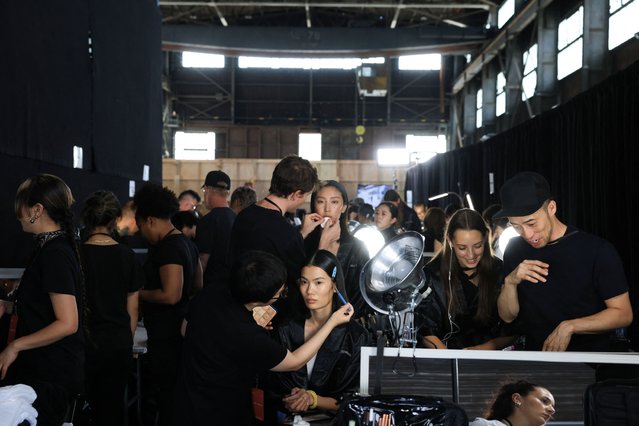 Models are prepared backstage before presenting creations by Jason Wu during New York Fashion Week in New York City, U.S., September 14, 2025. (Photo by Caitlin Ochs/Reuters)