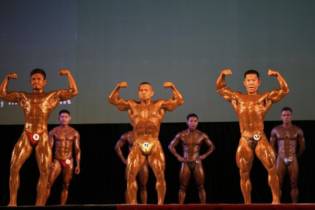 Contestants compete during their bodybuilding competition to mark International Olympic Day at the Myanmar Convention Center in Yangon, Myanmar, Saturday, June 28, 2025. (Photo by Thein Zaw/AP Photo)