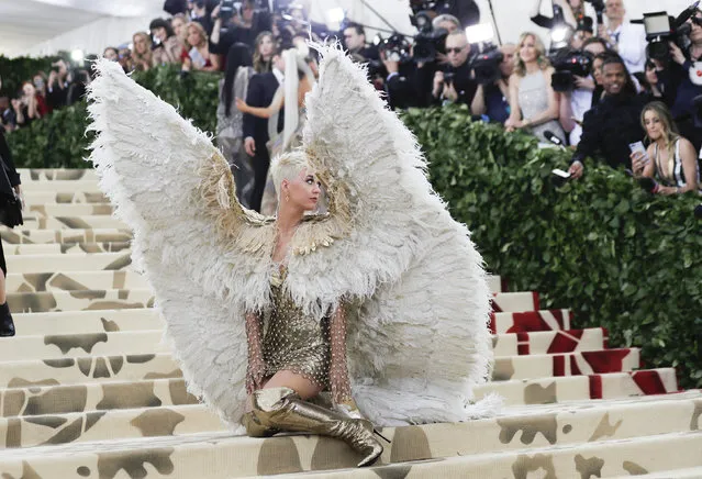 Singer-Songwriter Katy Perry arrives at the Metropolitan Museum of Art Costume Institute Gala (Met Gala) to celebrate the opening of “Heavenly Bodies: Fashion and the Catholic Imagination” in the Manhattan borough of New York, U.S., May 7, 2018. (Photo by Carlo Allegri/Reuters)