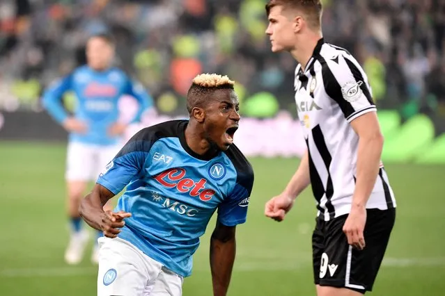 Napoli's Nigerian forward Victor Osimhen celebrates Napoli winning the Scudetto title after the referee blew the final whistle of the Italian Serie A football match between Udinese and Napoli on May 4, 2023 at the Friuli stadium in Udine. Napoli ended a 33-year wait to win Italy's Serie A on May 4 after a 1-1 draw at Udinese secured their third league title and emulated the great teams led by Diego Maradona. (Photo by Andrea Staccioli/AFP Photo)