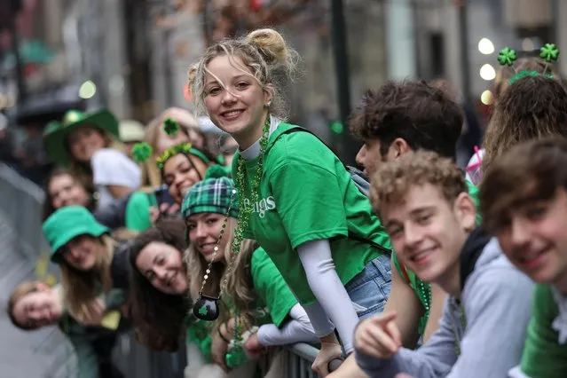 People participate in the St Patrick's Day Parade on 5th Avenue, in the Manhattan borough of New York City, New York, U.S., March 17, 2022. (Photo by Andrew Kelly/Reuters)