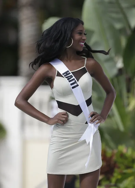 Miss Universe contestant Christie Desir, of Haiti, walks along the pool during the  Yamamay swimsuit runway show, Wednesday, January 14, 2015, in Doral, Fla. (Photo by Lynne Sladky/AP Photo)