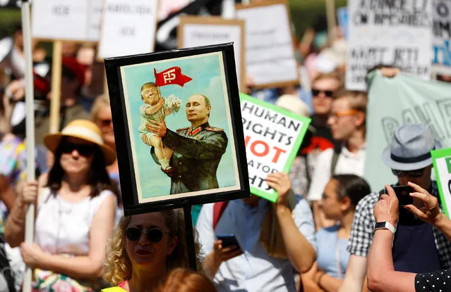 People attend 'Helsinki Calling' protest ahead of meeting between the U.S. President Donald Trump and Russian President Vladimir Putin in Helsinki, Finland July 15, 2018. (Photo by Leonhard Foeger/Reuters)