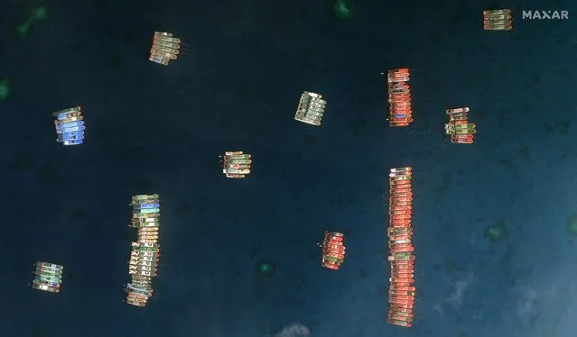 A view of one set of fishing vessels at Whitsun Reef in the South China Sea, March 23, 2021. The Philippines has filed a diplomatic protest over a “swarming and threatening” presence of 220 Chinese vessels it believes to be manned by militias at Whitsun Reef. (Photo by Maxar Technologies via Reuters)
