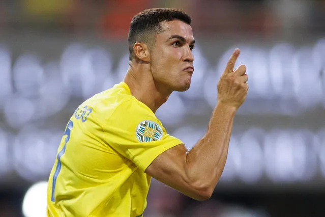 Nassr's Portuguese forward #07 Cristiano Ronaldo celebrates scoring his team's first goal during the 2023 Arab Club Champions Cup final football match between Saudi Arabia's Al-Hilal and Al-Nassr at the King Fahd Stadium in Taif on August 12, 2023. (Photo by AFP Photo/Stringer)