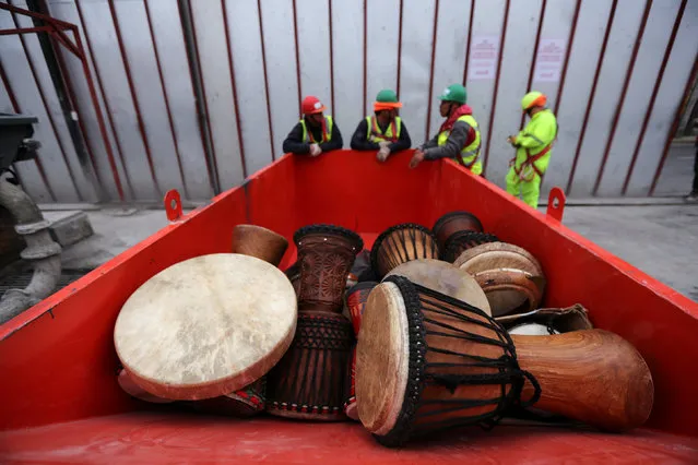 A container is loaded with drums to be used by labourers of a construction site to play music to avoid stress at their workplace in Santiago, Chile, September 26 2018. (Photo by Ivan Alvarado/Reuters)