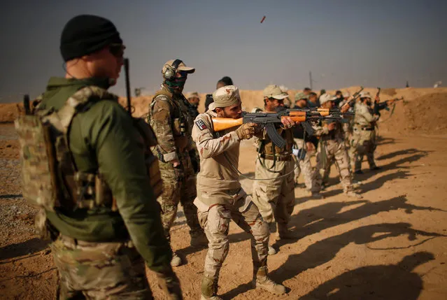 Members of the U.S. Army Special Forces provide training for Iraqi fighters from Hashid Shaabi at Makhmur camp in Iraq December 11, 2016. (Photo by Mohammed Salem/Reuters)