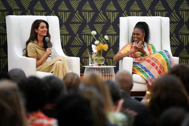 Leading human rights lawyer Amal Clooney speaks next to former U.S. first lady Michelle Obama during the Discussion on Ending Child Marriage and Empowering Adolescent Girls at the Centre for the Book in Cape Town, South Africa on November 16, 2023. (Photo by Nic Bothma/Reuters)