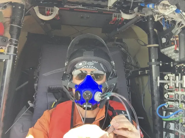 Swiss pilot Bertrand Piccard takes a selfie in the Solar Impulse 2 plane during the sixth leg of the round-the-world trip, from Chongqing Jiangbei International Airport to Nanjing Lukou International Airport in Jiangsu province, in China, in this April 21, 2015 handout photograph released by Solar Impulse. (Photo by Bertrand Piccard/Reuters/Solar Impulse)