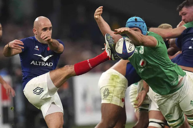 Ireland's Tadhg Beirne charges down a kick by France's Maxime Lucu during the Six Nations rugby union match between France and Ireland in Marseille, Friday, February 2, 2024. (Photo by Daniel Cole/AP Photo)